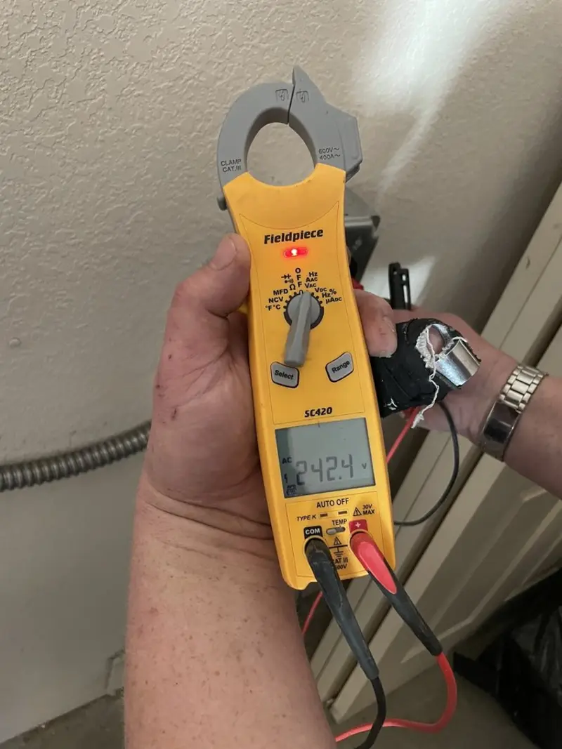 Voltage testing with clamp meter during Circuit Breaker Repair in Taylor Mill